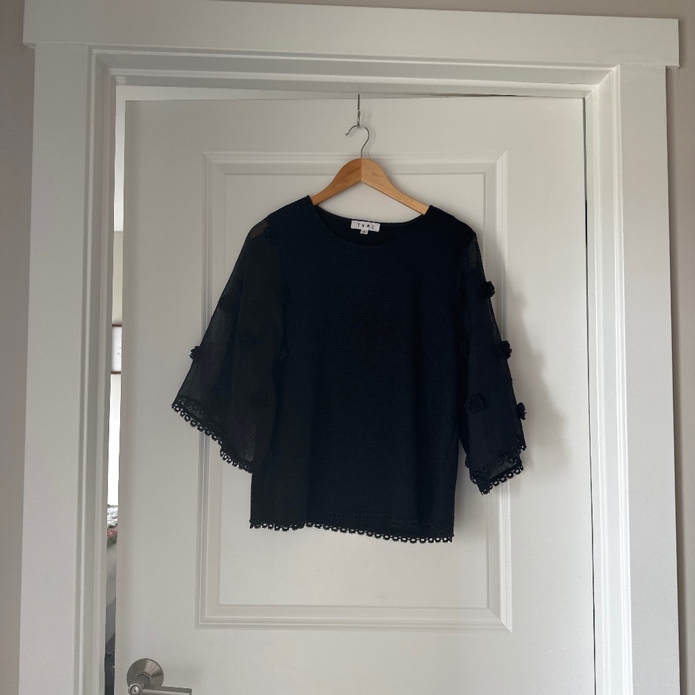 Black bell sleeve top